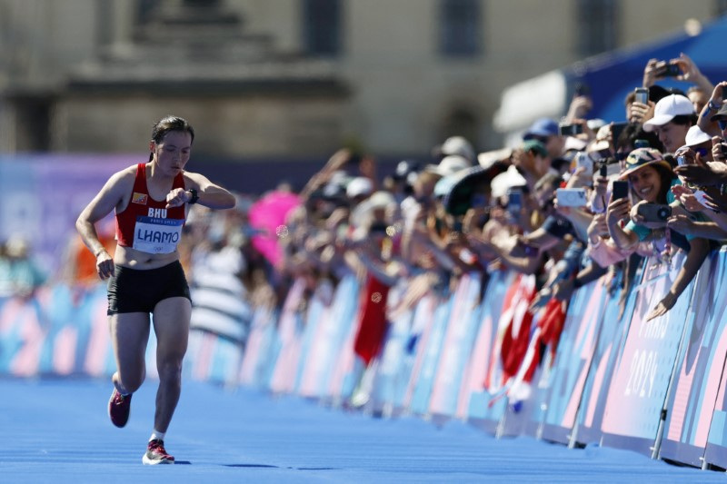 Bhutan’s marathon runner gets standing ovation for last-place finish – Reuters